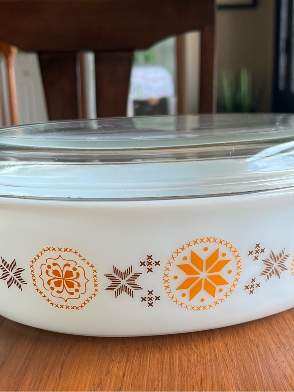 Pyrex White Casserole Dish with Orange and Brown Snowflake Medallions